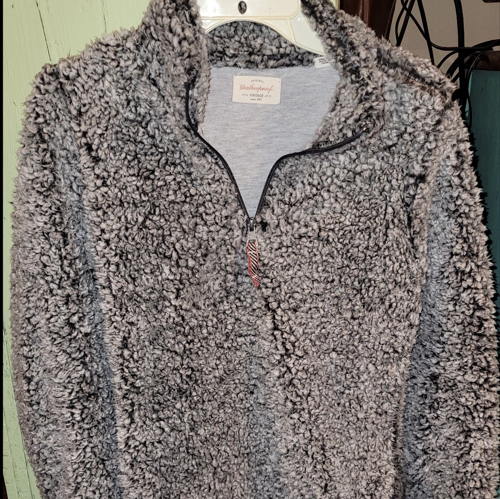 Ultra soft and warm ladies small 1/4 zip pull over. Cotton lined with pockets.